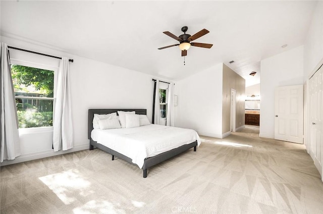 464 Appleby St, Corona, CA 92881 - bedroom with light colored carpet, lofted ceiling, ensuite bath, and ceiling fan