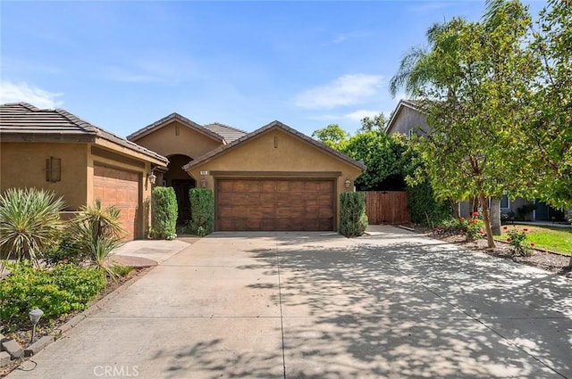 464 Appleby St, Corona, CA 92881 - view of front of property featuring driveway, a garage, and stucco siding