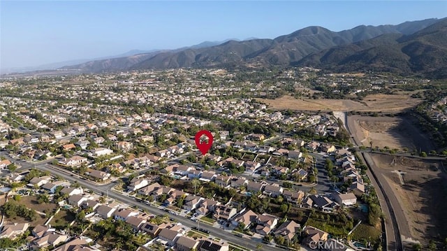 464 Appleby St, Corona, CA 92881 - aerial overview of property's location with a mountain backdrop and nearby suburban area