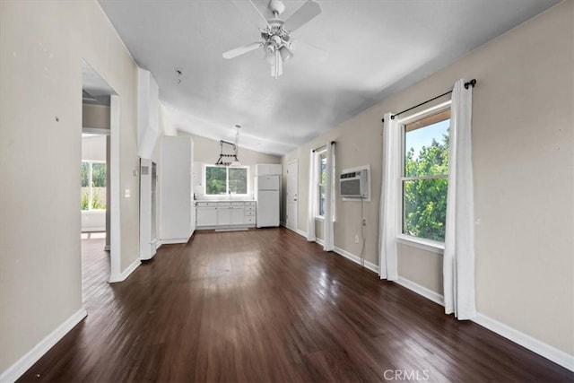 7100 Navajoa Ave, Atascadero, CA 93422 - unfurnished living room with lofted ceiling, ceiling fan, dark wood-type flooring, and a wall mounted air conditioner