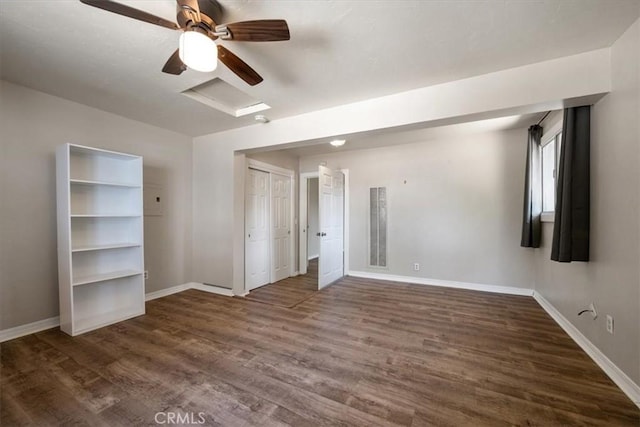 7100 Navajoa Ave, Atascadero, CA 93422 - unfurnished room featuring attic access, dark wood-style flooring, and ceiling fan