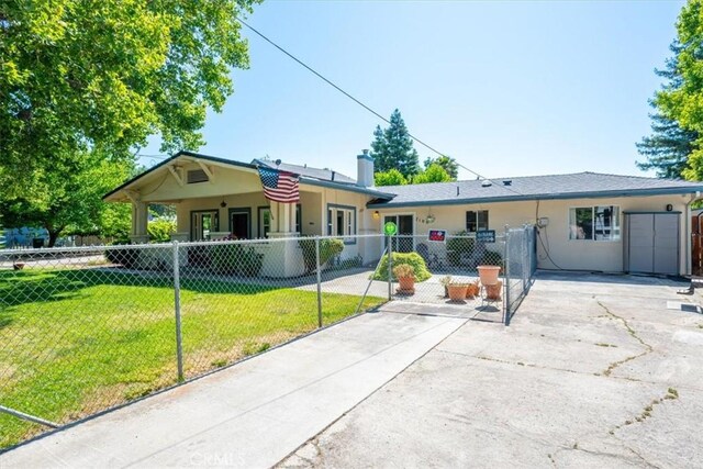 7100 Navajoa Ave, Atascadero, CA 93422 - view of front of home featuring a fenced front yard, stucco siding, and a chimney