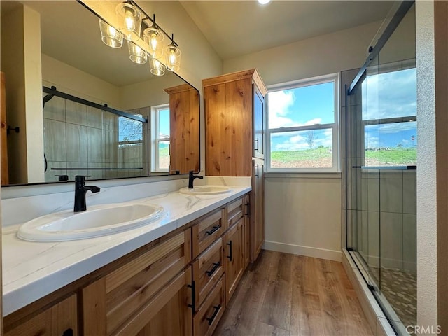 5980 Crestmoor Dr, Paradise, CA 95969 - full bath with wood finished floors, a shower stall, and double vanity
