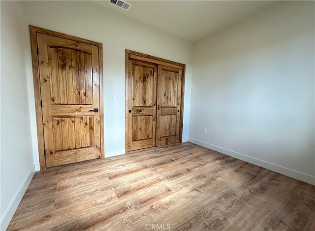 5980 Crestmoor Dr, Paradise, CA 95969 - unfurnished bedroom featuring light wood-style flooring