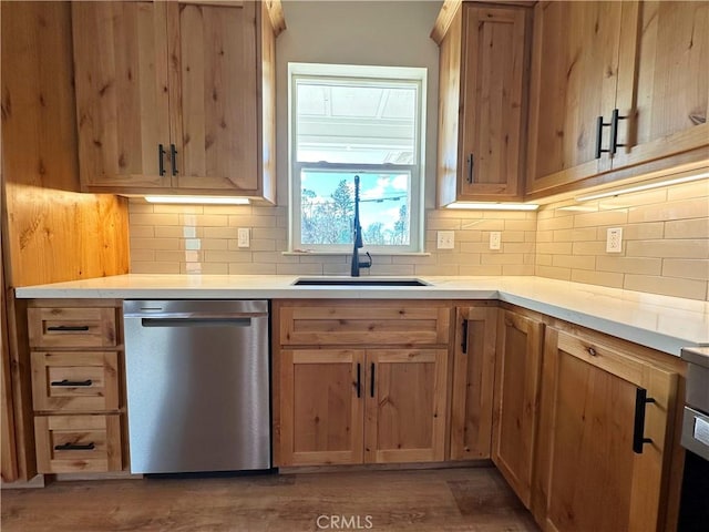 5980 Crestmoor Dr, Paradise, CA 95969 - kitchen featuring stainless steel dishwasher, decorative backsplash, wood finished floors, and light countertops