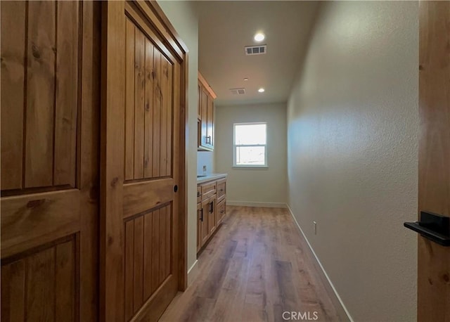 5980 Crestmoor Dr, Paradise, CA 95969 - hallway with light wood-style flooring and recessed lighting