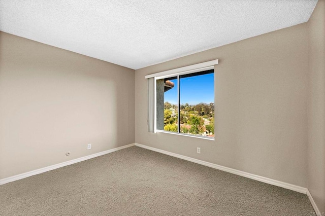 1866 Forestdale Dr, Encinitas, CA 92024 - carpeted spare room featuring baseboards and a textured ceiling