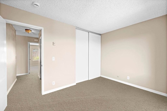 1866 Forestdale Dr, Encinitas, CA 92024 - unfurnished bedroom with carpet flooring, a textured ceiling, and a closet