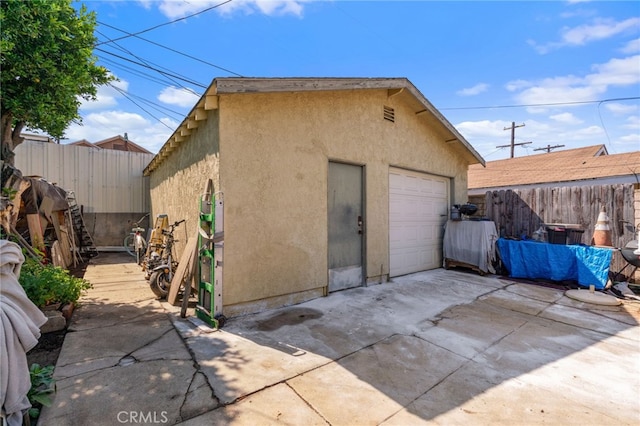 1026 Sentinel Ave, Los Angeles, CA 90063 - detached garage featuring concrete driveway