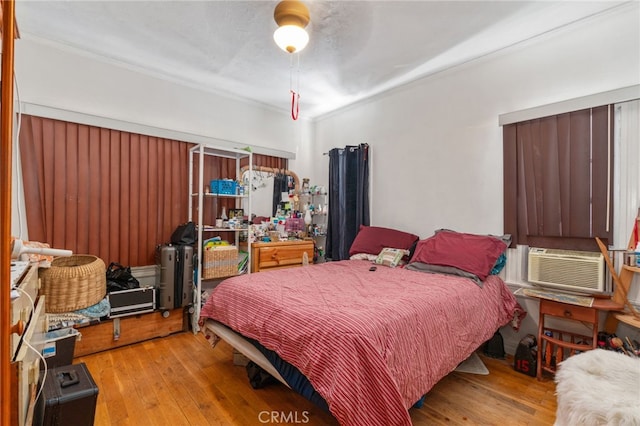 1026 Sentinel Ave, Los Angeles, CA 90063 - bedroom with ornamental molding, hardwood / wood-style floors, and cooling unit