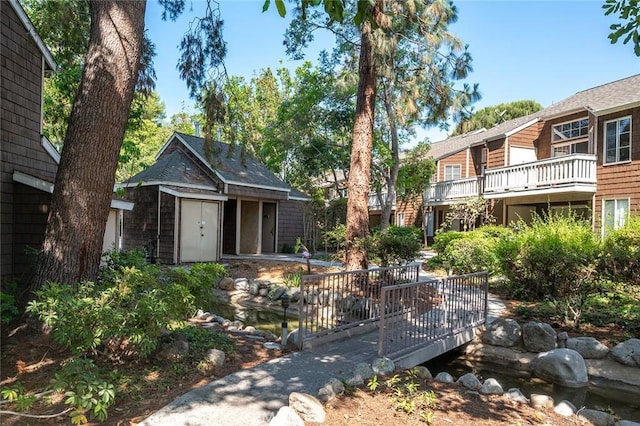 12555 Euclid St Unit 2, Garden Grove, CA 92840 - view of home's community with a storage shed and a deck