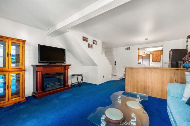 12555 Euclid St Unit 2, Garden Grove, CA 92840 - carpeted living area featuring a glass covered fireplace