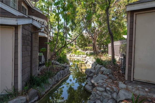 12555 Euclid St Unit 2, Garden Grove, CA 92840 - view of yard with a small pond