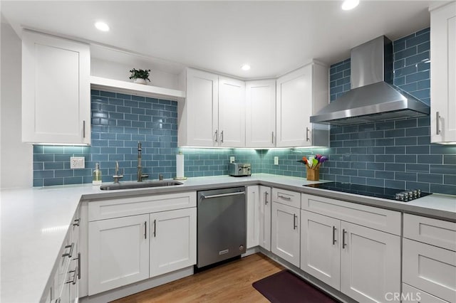 321 S San Vicente Blvd Unit 507, Los Angeles, CA 90048 - kitchen with stainless steel dishwasher, wall chimney range hood, black electric stovetop, white cabinetry, and tasteful backsplash