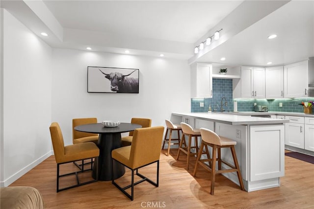 321 S San Vicente Blvd Unit 507, Los Angeles, CA 90048 - dining space with recessed lighting and light wood-style flooring