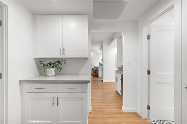 321 S San Vicente Blvd Unit 507, Los Angeles, CA 90048 - hall featuring light wood-style floors and baseboards