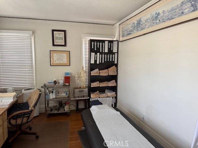 242 N St Andrews Pl, Los Angeles, CA 90004 - office area featuring dark wood-style flooring and crown molding