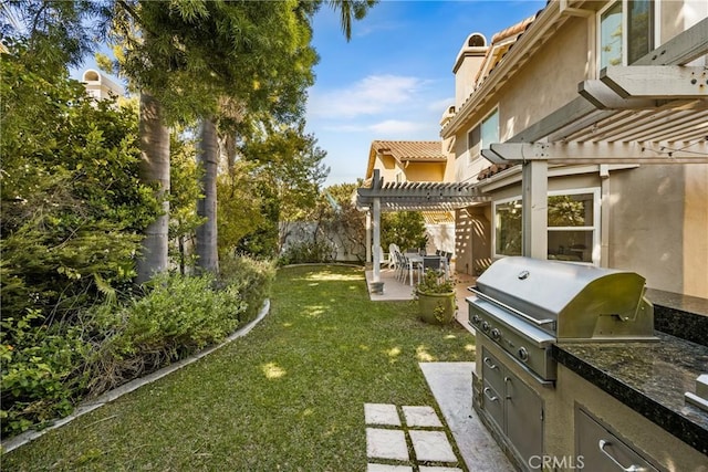 5 Bergamo, Irvine, CA 92614 - view of yard with a pergola, an outdoor kitchen, and a patio area