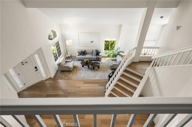 5 Bergamo, Irvine, CA 92614 - entryway featuring wood finished floors, stairs, and a high ceiling