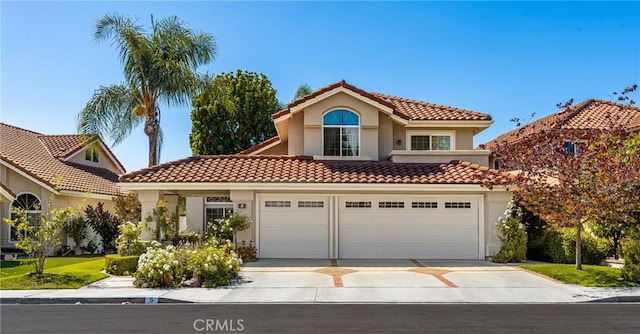 5 Bergamo, Irvine, CA 92614 - mediterranean / spanish house featuring driveway, stucco siding, a tile roof, and an attached garage