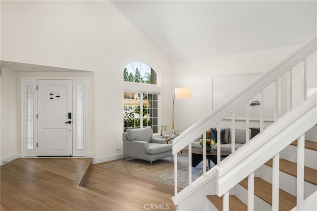 5 Bergamo, Irvine, CA 92614 - foyer featuring stairs, high vaulted ceiling, and hardwood / wood-style floors