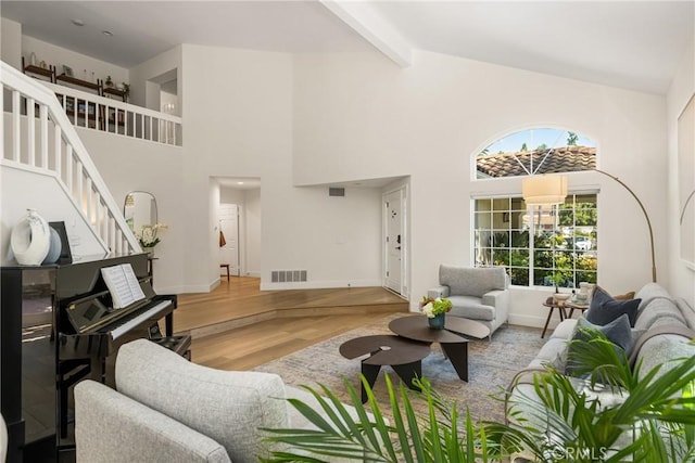 5 Bergamo, Irvine, CA 92614 - living area with wood finished floors, stairway, high vaulted ceiling, and beamed ceiling
