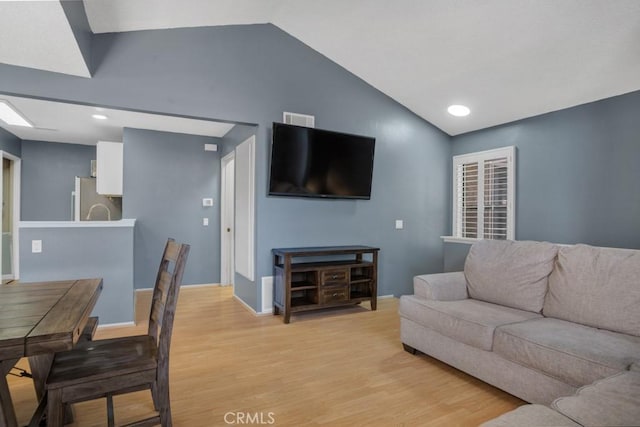 2367 Archwood Ln Unit 171, Simi Valley, CA 93063 - living area featuring light wood-style flooring and high vaulted ceiling