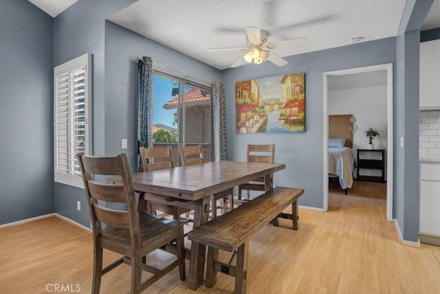 2367 Archwood Ln Unit 171, Simi Valley, CA 93063 - dining room with ceiling fan, light wood-style flooring, and a textured ceiling