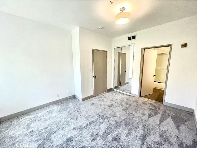 14914 Hamlin St Unit 105, Van Nuys, CA 91411 - unfurnished bedroom featuring carpet, a closet, and ensuite bath