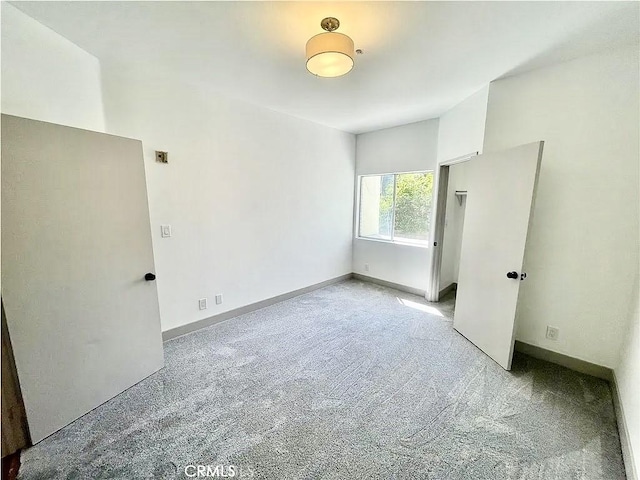 14914 Hamlin St Unit 105, Van Nuys, CA 91411 - carpeted spare room with baseboards
