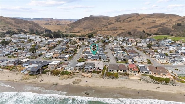 1851 Pacific Ave, Cayucos, CA 93430 - aerial view of property and surrounding area featuring nearby suburban area and a water and mountain view