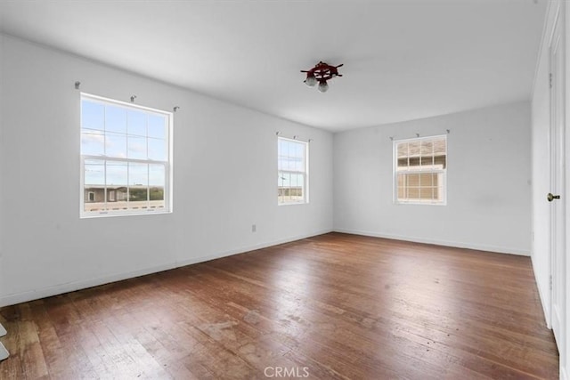 1851 Pacific Ave, Cayucos, CA 93430 - empty room featuring wood finished floors and baseboards