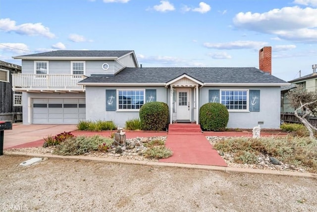 1851 Pacific Ave, Cayucos, CA 93430 - traditional home with stucco siding, driveway, a garage, and a chimney