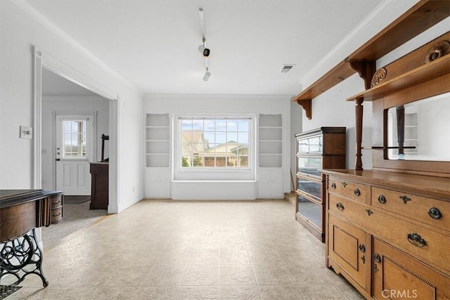 1851 Pacific Ave, Cayucos, CA 93430 - living room with built in shelves, plenty of natural light, and ornamental molding