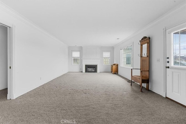 1851 Pacific Ave, Cayucos, CA 93430 - unfurnished living room with crown molding, carpet floors, plenty of natural light, and a fireplace