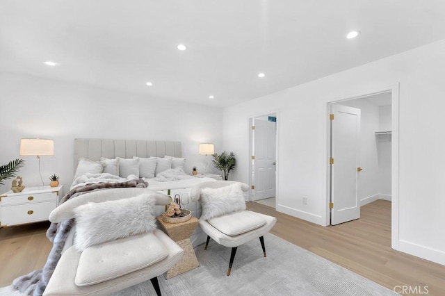 9500 Texhoma Ave, Northridge, CA 91325 - bedroom featuring light wood-type flooring, recessed lighting, and a spacious closet