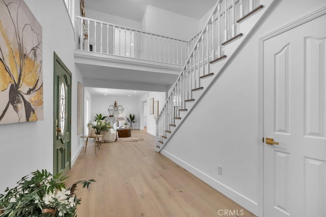 9500 Texhoma Ave, Northridge, CA 91325 - entrance foyer featuring stairway, light wood-type flooring, a high ceiling, and recessed lighting