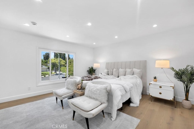9500 Texhoma Ave, Northridge, CA 91325 - bedroom with light wood-style flooring and recessed lighting
