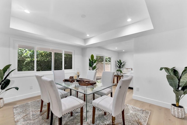 9500 Texhoma Ave, Northridge, CA 91325 - dining space featuring a raised ceiling, light wood-type flooring, and recessed lighting
