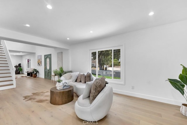 9500 Texhoma Ave, Northridge, CA 91325 - living area with light wood-style floors, recessed lighting, and stairs