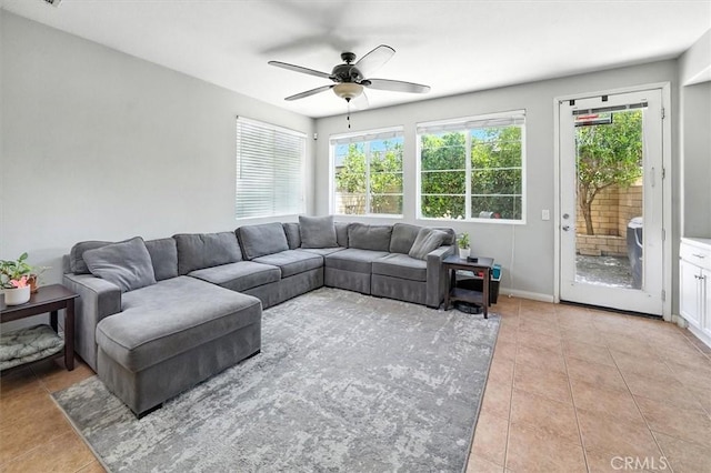 28440 Casselman Ln Unit 361, Saugus, CA 91350 - living room featuring light tile patterned floors, plenty of natural light, and a ceiling fan