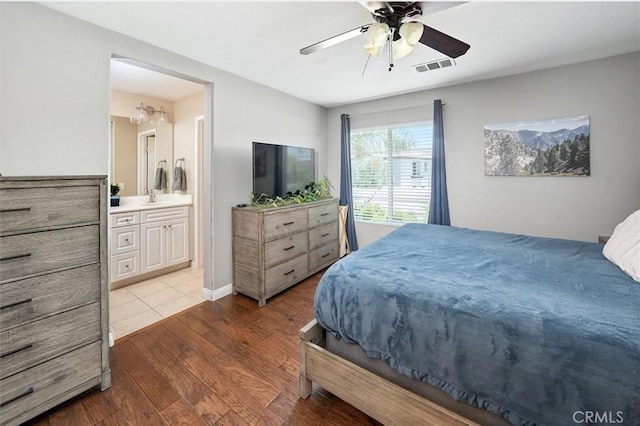 28440 Casselman Ln Unit 361, Saugus, CA 91350 - bedroom featuring wood finished floors, ensuite bath, and ceiling fan