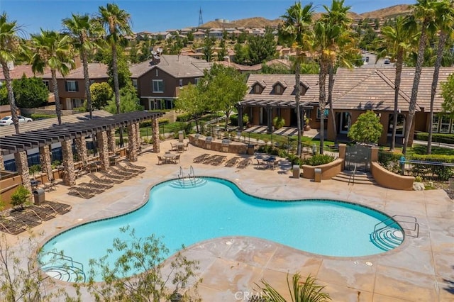 28440 Casselman Ln Unit 361, Saugus, CA 91350 - community pool featuring a patio, a pergola, and a residential view
