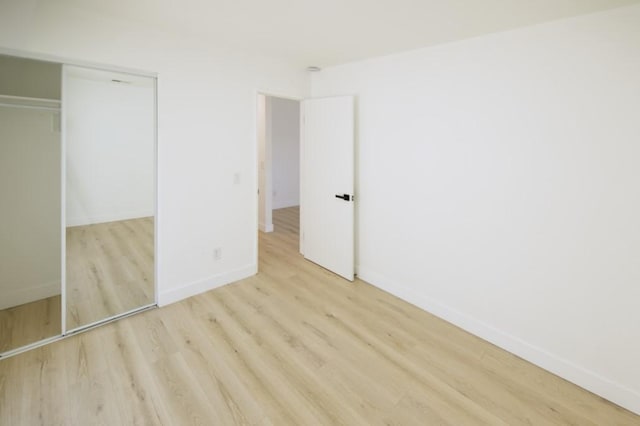 1564 Ashbury Way, Perris, CA 92571 - unfurnished bedroom with wood finished floors and a closet
