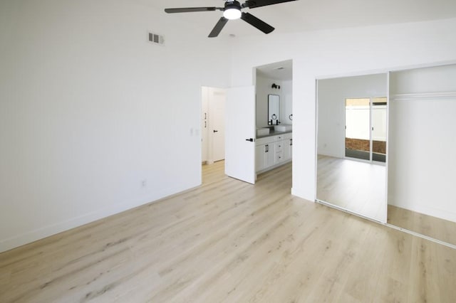 1564 Ashbury Way, Perris, CA 92571 - unfurnished bedroom featuring vaulted ceiling, light wood-type flooring, and ceiling fan