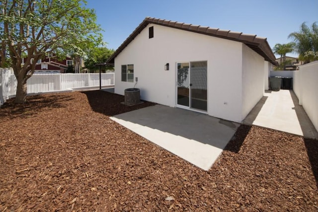 1564 Ashbury Way, Perris, CA 92571 - rear view of property with stucco siding, a fenced backyard, a patio, and a tiled roof