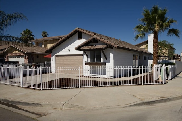 1564 Ashbury Way, Perris, CA 92571 - view of front of house with a garage, concrete driveway, a fenced front yard, and a tile roof