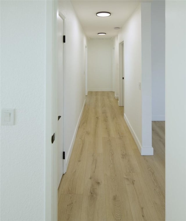 1564 Ashbury Way, Perris, CA 92571 - hall featuring light wood-style floors and baseboards