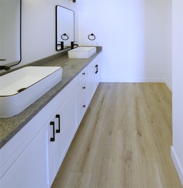 1564 Ashbury Way, Perris, CA 92571 - full bathroom with wood finished floors and double vanity