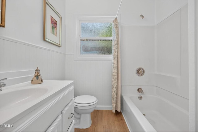 901 Drown Ave, Ojai, CA 93023 - full bathroom with wood finished floors, vanity, shower / bathtub combination with curtain, and wainscoting